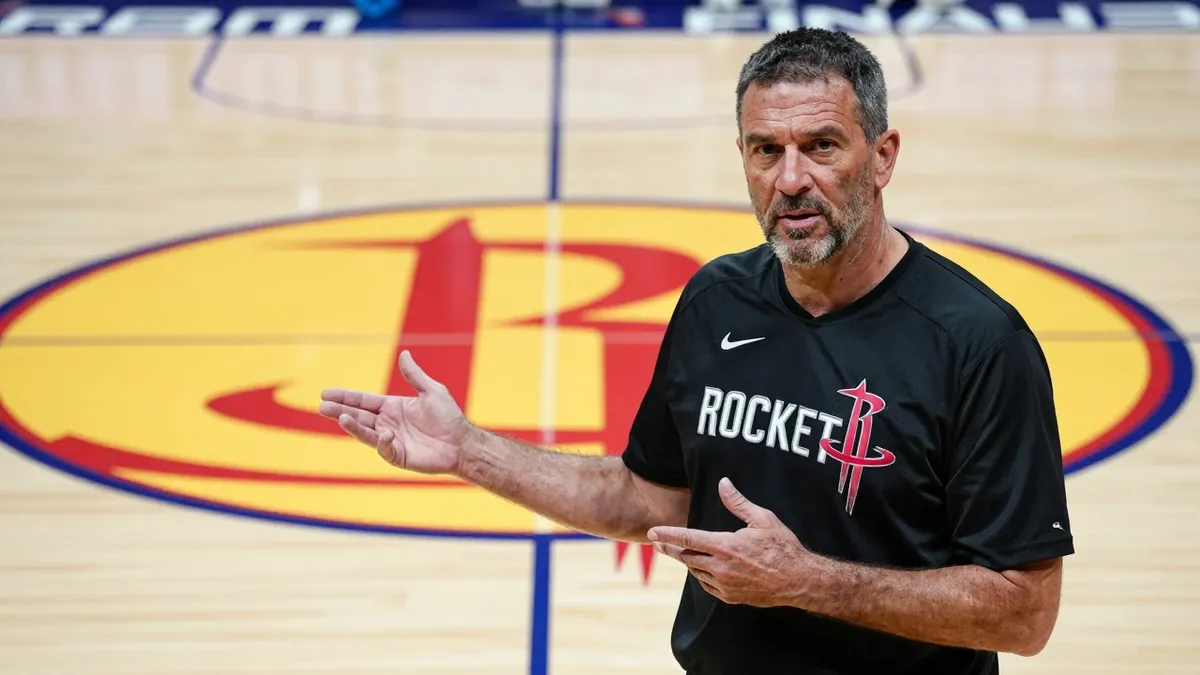 The Houston Rockets have leaked a new court design featuring the Dunkstronaut logo, set to debut in the 2026-27 season